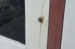 Bullet found lodged in the window frame of a house in Himmafushi island.