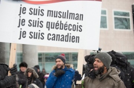People march in solidarity in Quebec City February 5, 2017 a week after the January 29 assault on the Islamic Cultural Center. / AFP PHOTO / Alice Chiche