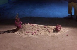 The "grave" made by MDP supports on a road in A.A. Ukulhas over an MDP activist signing to ruling PPM.