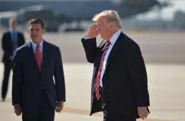 The White House announced February 13, 2017 that Michael Flynn has resigned as President Donald Trump's national security advisor, amid escalating controversy over his contacts with Moscow. In his formal resignation letter, Flynn acknowledged that in the period leading up to Trump's inauguration: "I inadvertently briefed the vice president-elect and others with incomplete information regarding my phone calls with the Russian ambassador." / AFP PHOTO / MANDEL NGAN