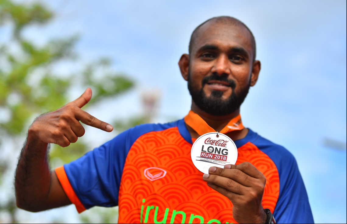 ހުޅުމާލެ: އޭޕްރިލް 120، 2018- ޓޯޓަލް ފިޓްނަސް ގްރޫޕް (ޓީއެފްޖީން) އިން ބޭއްވި ކޮކާކޯލާ ލޯންގް ރަންގެ ހަ ވަނަ އިވެންޓްގެ ތެރެއިން: ބޮޑު ތަރުހީބަކާއިއެކު ހުޅުމާލޭގައި، ހަތަރު ރޭހަކަށް ބަހާލައިގެން ބޭއްވި މިދުވުމުގައި ޖުމްލަ 1500 ދުވުންތެރިން ވަނީ ބައިވެރިވެފައި.--ފޮޓޯ: ހުސައިން ވަހީދު/މިހާރު