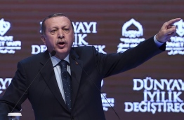 Turkey's President Recep Tayyip Erdogan on March 12 threatened that the Netherlands would "pay a price" after expelling a Turkish minister from the country. / AFP PHOTO / OZAN KOSE