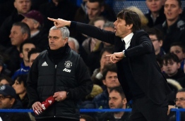 Chelsea's Italian head coach Antonio Conte (R) gestures on the touchline as Manchester United's Portuguese manager Jose Mourinho (L) looks on during the English FA Cup quarter final football match between Chelsea and Manchester United at Stamford Bridge in London on March 13, 2017. / AFP PHOTO / Glyn KIRK / RESTRICTED TO EDITORIAL USE. No use with unauthorized audio, video, data, fixture lists, club/league logos or 'live' services. Online in-match use limited to 75 images, no video emulation. No use in betting, games or single club/league/player publications. /