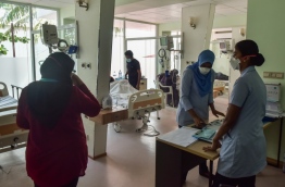 Nurses at work in the flu clinic opened in IGMH. PHOTO: HUSSAIN WAHEED/MIHAARU
