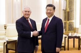 Tillerson met Xi on March 19 just hours after a North Korean rocket engine test added new pressure on the big powers to address the threat from Pyongyang. / AFP PHOTO / POOL / THOMAS PETER