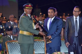 Defence Minister Adam Shareef (R) beside President Yameen (C) at the closing ceremony of MNDF 12th Drill Competition. PHOTO/PRESIDENT'S OFFICE