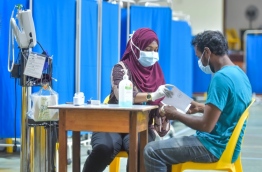 A patient consulting at IGMH's flu clinic. PHOTO: HUSSAIN WAHEED/MIHAARU