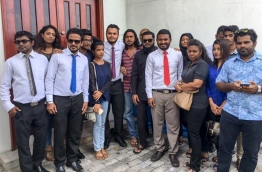 Raajje TV staff pictured outside the Criminal Court. FILE PHOTO/MIHAARU