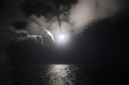 US President Donald Trump ordered a massive military strike on a Syrian air base on Thursday in retaliation for a "barbaric" chemical attack he blamed on President Bashar al-Assad. / AFP PHOTO / US NAVY / Ford WILLIAMS / RESTRICTED TO EDITORIAL USE - MANDATORY CREDIT "AFP PHOTO / US NAVY / Mass Communication Specialist 3rd Class Robert S. Price" - NO MARKETING NO ADVERTISING CAMPAIGNS - DISTRIBUTED AS A SERVICE TO CLIENTS