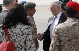 U.S. Defense Secretary James Mattis (C-R) is greeted by Saudi Armed Forces Chief of Joint Staff General Abdul Rahman Al Banyan (C-L) upon his arrival at the Riyadh Air Base on April 18, 2017 at the start of a Middle East tour. / AFP PHOTO / POOL / JONATHAN ERNST