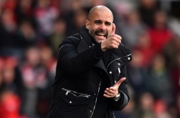 Manchester City's Spanish manager Pep Guardiola gestures on the touchline during the English Premier League football match between Southampton and Manchester City at St Mary's Stadium in Southampton, southern England on April 15, 2017. / AFP PHOTO / Glyn KIRK / RESTRICTED TO EDITORIAL USE. No use with unauthorized audio, video, data, fixture lists, club/league logos or 'live' services. Online in-match use limited to 75 images, no video emulation. No use in betting, games or single club/league/player publications. /