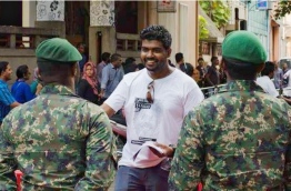 Yameen Rasheed at a march he organised to demand justice for Ahmed Rilwan, a journalist that was allegedly abducted and has been missing for over two years. PHOTO/DANIEL BOSLEY