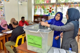 A woman casts her vote in a voting centre in Male during the Local Council Elections 2017. PHOTO: NISHAN ALI/MIHAARU