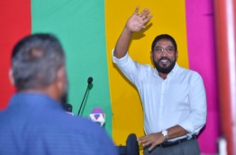 Jumhoory Party leader Qasim Ibrahim gestures as he speaks at an opposition rally for the first time after his release from prison. PHOTO: HUSSAIN WAHEED/MIHAARU