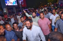Supporters greet Jumhoory Party leader Qasim Ibrahim as he attends an opposition rally for the first time after his release from prison. PHOTO: HUSSAIN WAHEED/MIHAARU