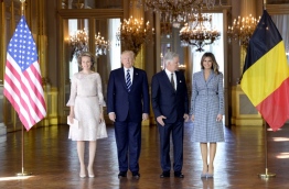 (L-R) Queen Mathilde of Belgium, US President Donald Trump, King Philippe - Filip of Belgium (R) and US First Lady Melania Trump stand during a reception at the Royal Palace in Brussels, on May 24, 2017. / AFP PHOTO / THIERRY CHARLIER