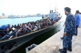 At least 20 boats carrying thousands of migrants on their way to Italy were spotted off the coast of the western city of Sabratha, the Libyan navy said. / AFP PHOTO / MAHMUD TURKIA