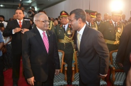 Former presidents Maumoon Abdul Gayoom (L) and Mohamed Nasheed at a function.