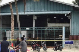 Police block off ice plant in H.A. Ihavandhoo after local man found murdered inside.