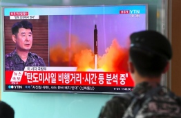 North Korea launched a ballistic missile on July 4, the South's military said, just days after Seoul's new leader Moon Jae-In and US President Donald Trump focused on the threat from Pyongyang in their first summit. / AFP PHOTO / JUNG Yeon-Je