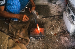 Blacksmith Solih Hussein in GDh Nadellaa. PHOTO/AISHATH NAJ