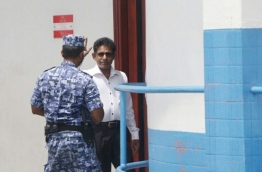 Thulusdhoo MP Mohamed Waheed Ibrahim outside the Criminal Court before his remand hearing. PHOTO: HUSSAIN WAHEED/MIHAARU