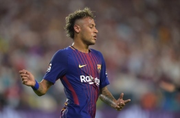 Neymar of Barcelona reacts during their International Champions Cup football match at Hard Rock Stadium on July 29, 2017 in Miami, Florida. / AFP PHOTO / HECTOR RETAMAL