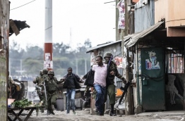 Kenyan police shot dead two protesters in the capital's flashpoint Mathare slum on August 9, as unrest broke out after opposition accusations that the general election was rigged, a senior officer told AFP. / AFP PHOTO / MARCO LONGARI