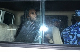 The suspect arrested over Nadeem Abdul Raheem's murder pictured inside a Police vehicle after his arrest. PHOTO: HUSSAIN WAHEED/MIHAARU
