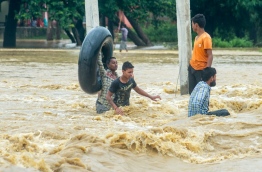 Floods and landslides caused by torrential monsoon rains have killed at least 40 people in the last three days across Nepal, officials said on August 13. Heavy rains have hit more than a dozen districts in the country's far eastern region as well as some areas in the west since the morning of August 11, the home ministry said. / AFP PHOTO / Manish PAUDEL