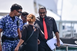 Ex-VP Ahmed Adheeb escorted back to Dhoonidhoo detention centre after his preliminary hearing at the Criminal Court. PHOTO: HUSSAIN WAHEED/MIHAARU
