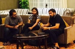 Qasim Ibrahim (R) with his lawyers at the VIP lounge in Velana International Airport (VIA) before departing to Singapore.