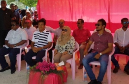 First Lady Fathmath Ibrahim (C) with Deputy Speaker of the parliament Moosa Manik (L) and MP Ibrahim Falah (R) at Meedhoo in Raa Atoll. PHOTO / PPM