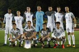England's starting XI, (L-R top row) England's striker Marcus Rashford, England's defender Kieran Trippier, England's defender Michael Keane, England's goalkeeper Jack Butland, England's defender Harry Maguire, England's defender John Stones and England's midfielder Jordan Henderson and (L-R bottom row) England's defender Aaron Cresswell, England's striker Harry Kane, England's midfielder Harry Winks and England's midfielder Dele Alli during the 2018 FIFA World Cup European Qualifying football match between Lithuania and England at the LFF Stadium in Vilnius on October 8, 2017. / AFP PHOTO / Adrian DENNIS