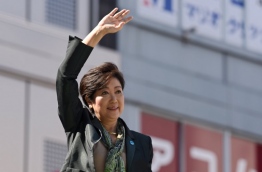 Tokyo's popular governor Yuriko Koike launched a bitter attack on Prime Minister Shinzo Abe on October 10 as the gloves came off for the official start of a snap election campaign in the world's third-largest economy. / AFP PHOTO / Kazuhiro NOGI