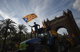 Spain's worst political crisis in a generation will come to a head as Catalonia's leader could declare independence from Madrid in a move likely to send shockwaves through Europe. / AFP PHOTO / JORGE GUERRERO
