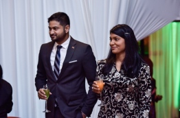 Amin Javed Faizal (L) with his wife, gender minister Zeneesha Zaki, pictured at the official Independence Day ceremony in July 2017. PHOTO: HUSSAIN WAHEED/MIHAARU