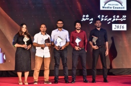 Journalism Awards' winners of Mihaaru pose for picture with their trophies (L-R): Aminath Mohamed Saeed (sister of Aasiyath Mohamed Saeed who accepted the award on the latter's behalf), Niumathullah Idrees, Ali Naafiz, Azzam Alifulhu and Muizzu Ibrahim. PHOTO: NISHAN ALI/MIHAARU