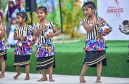 Children pictured performing a dance at the Sports Stars Fiesta in Maafushi. PHOTO: HUSSAIN WAHEED/MIHAARU