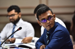 Finance minister Ahmed Munawar pictured at a meeting of the parliamentary budget review committee. PHOTO: HUSSAIN WAHEED/MIHAARU