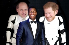 John Boyega (C) with the images of Princes William (L) and Harry added in as stormtroopers. IMAGE/BBC
