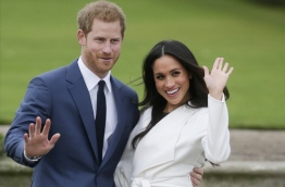 Britain's Prince Harry will marry his US actress girlfriend Meghan Markle early next year after the couple became engaged earlier this month, Clarence House announced on Monday. / AFP PHOTO / Daniel LEAL-OLIVAS