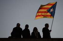 Lawmakers opted to split from Spain, claiming they had a mandate after a referendum on October 1 in which 90 percent of voters backed secession. / AFP PHOTO / Josep LAGO