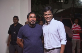 JP's leader Qasim Ibrahim (L) and Umar Naseer pose for a picture. PHOTO/MIHAARU