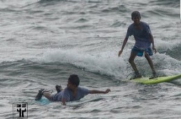 Arsham Ibrahim surfing. PHOTO / RAALHU EDHURU