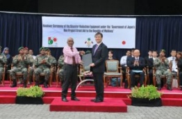 Parliamentary Vice-Minister for Foreign Affairs of Japan, Iwao Horii (R), presents disaster reduction equipment on behalf of the Japanese government to the Maldives, received by state defence minister Mohamed Zuhair. PHOTO/FOREIGN MINISTRY
