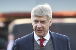 Wenger will start his three-match touchline ban at Nottingham on January 7 after being sanctioned by the Football Association over comments he made about the refereeing of Arsenal's Premier League game against West Brom last weekend. His ban will also cover the League Cup semi-final first leg at Chelsea on January 10 and next weekend's Premier League trip to Bournemouth. / AFP PHOTO / Oli SCARFF / RESTRICTED TO EDITORIAL USE. No use with unauthorized audio, video, data, fixture lists, club/league logos or 'live' services. Online in-match use limited to 75 images, no video emulation. No use in betting, games or single club/league/player publications. /