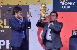 President Yameen holding the World Cup trophy on Wednesday night