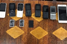 Phones seized from the man trying to smuggle them into Asseryri Prison. PHOTO/POLICE