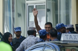 Former defence minister Mohamed Nazim escorted back to jail from house arrest on February 6, 2018. PHOTO: HUSSAIN WAHEED/MIHAARU